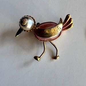 Elegant Gold and Silver Bird Brooch